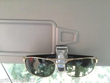 supporti per occhiali da sole