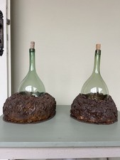 Coppia antichi fiaschi in vetro soffiato con base