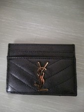  Portacarte Yves Saint Laurent, in pelle nera.