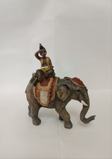 ELEFANTE CON BAMBINO stile