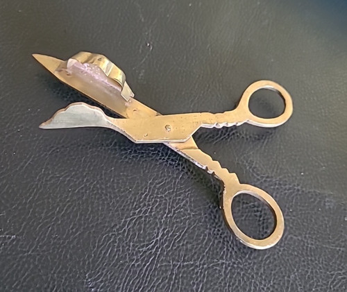 Forbici stoppino snuffer