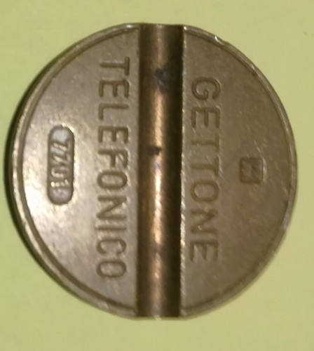 Gettone telefonico con segno - con,