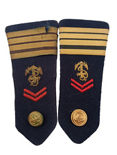 E18) Coppia di spalline