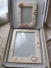 Cornici portafoto in ceramica