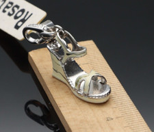 750/1000.18KT ROSE GOLD CHARMS