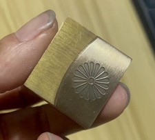 Habaki in due parti con stemma