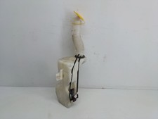 Bottiglia e motore lavatrice