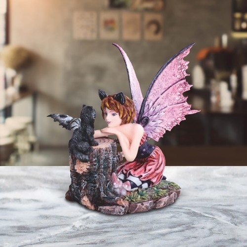 Statua fata rosa con - statua,