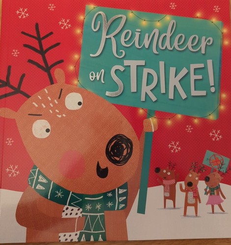 Reindeer strike holly - on, by