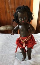 Bambola nera in plastica dura