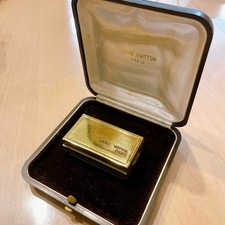 Louis Vuitton fermacarte baule