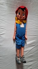 migliorati bambola pinocchio