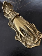 Mano fermacarte in ottone