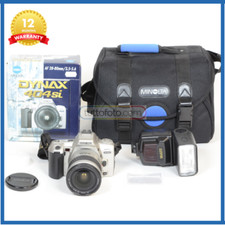 Minolta 404Si + 28-80 mm. F. 3.5-5.6 + Flash Sunpak + borsa