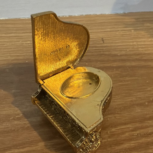 Avon gold grand piano - avon,
