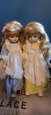 coppia di bambole in ceramica