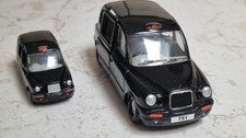 2 modelli London Taxi TX1 Corgi