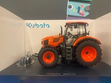 Trattore Kubota M7-172 scala