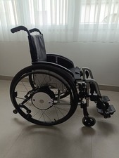 Sedia a rotelle pieghevole