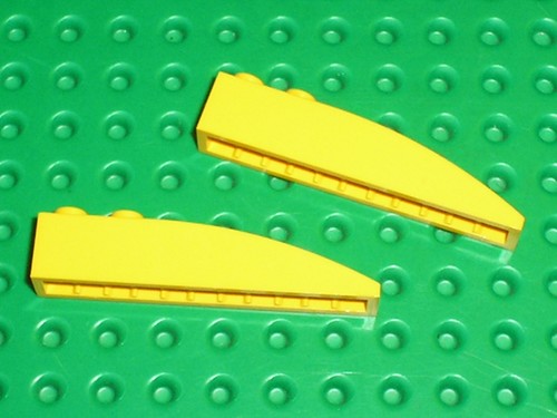 Lego yellow slope brick - x,