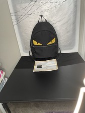 Zaino Fendi Monster Eyes con occhi gialli in pelle e nylon con certificato di autenticità
