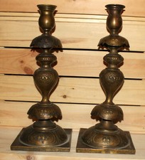 Antica coppia di candelabri in