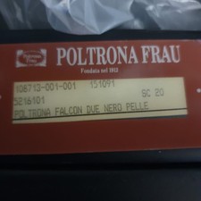 poltrona frau Falcon due pelle nera con puf