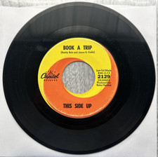 THIS SIDE UP "Book A Trip /