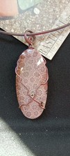 Pendente in corallo fossile e