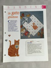 Schema punto croce Bambini Un gatto ghiottone bavaglino