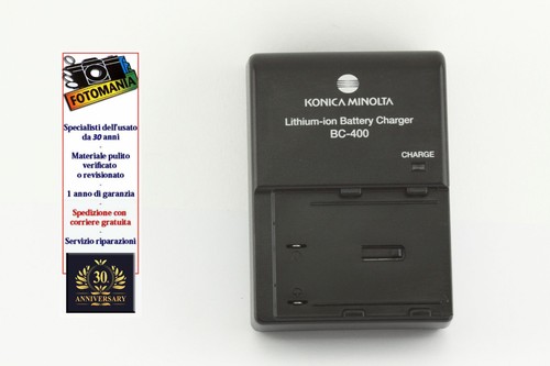 Konica minolta caricabatteriar - konica,