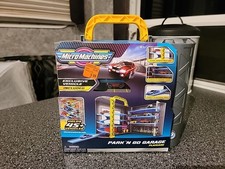 Micro Machines Park and Go Garage Playset ~ Contiene 45+ Auto
