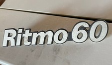 Scritta posteriore in metallo, per Fiat Ritmo 60 1° serie dal 78.  [7228.20]