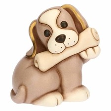 Cane Thun Todo con giornale