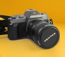 ? Pentax P30 T con Pentax zoom 28-80  Dal 1986   No ME-MX-K1000