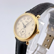 Orologio da polso Seiko quarzo piccolo secondo oro 1428 0010 batteria sostituita