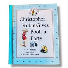CHRISTOPHER ROBIN GIVES POOH A
