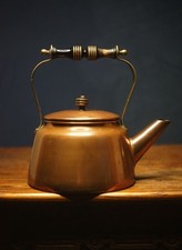 Antico bollitore in rame con