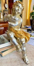 Vecchio putto in legno gessato, rifinito a foglia oro/argento 43cm