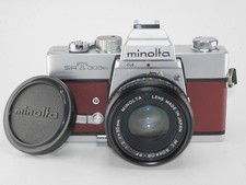 Minolta SRT 303b con pelle 50/f.2 rosso vino