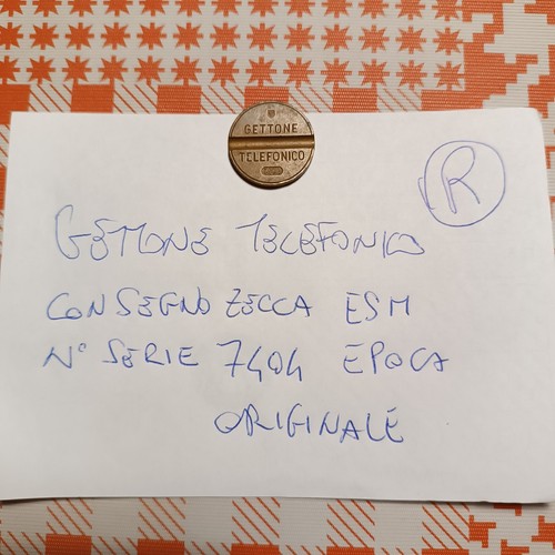 Gettone telefonico con segno - gettone,