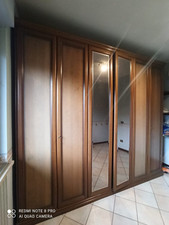 Armadio in legno scuro con cassetti A 6 Ante