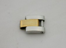 Maglia in acciaio e oro per