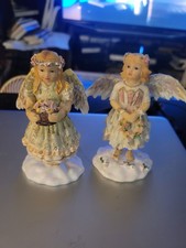 2 statuine angelo Les Alpes