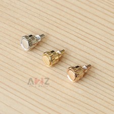 Pulsante orologio oro 18