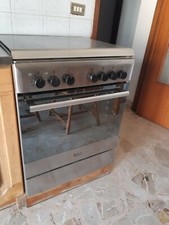 Hotpoint 75*60*58: 4 fornelli e 1 forno. Argentato. Usato, ottime condizioni.