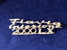 LANCIA FLAVIA INIEZIONE 2000 LX SIGLA SCRITTA EMBLEMA FREGIO STEMMA METALLO 4PZ.
