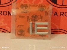 ALFA ROMEO 33 / 75 SIGLA FREGIO MODELLO POSTERIORE "IE" 60515259