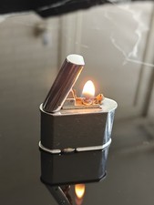 Raro accendino pop-up vintage