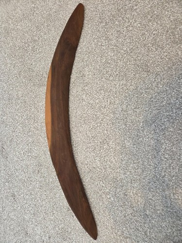 Hand carved boomerang - hand,